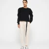 belted pants pinstripe