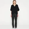 leather look flared pants