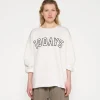raw edge statement sweater