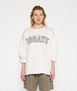 raw edge statement sweater
