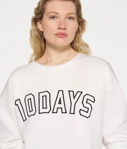 raw edge statement sweater