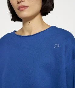 raw edge statement sweater