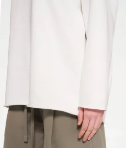 raw edge statement sweater