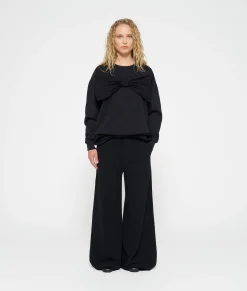 statement sweater bow