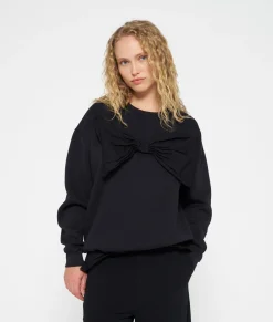 statement sweater bow