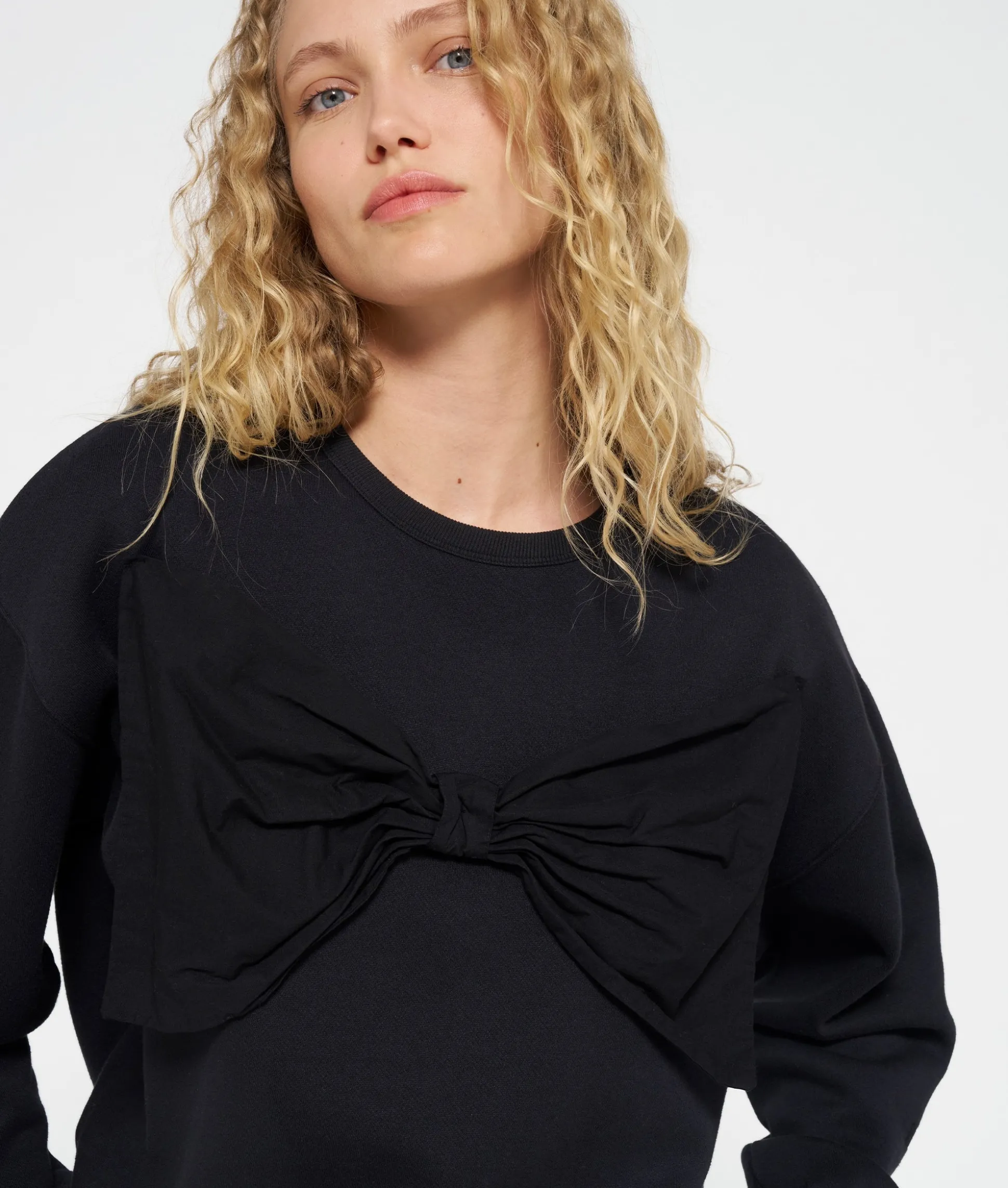 statement sweater bow