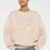 statement sweater logo