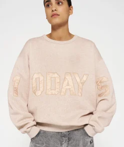 statement sweater logo