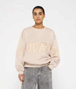 statement sweater logo